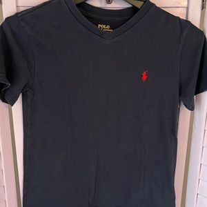 Polo by Ralph Lauren.  Very dark blue with red pony for boys